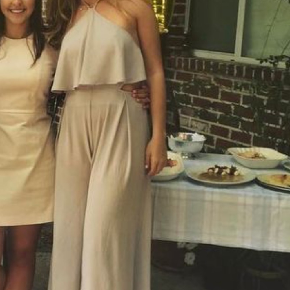 Light grey jumpsuit with ruffle